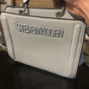 Selling light blue Steve Madden shoulder bag light usage